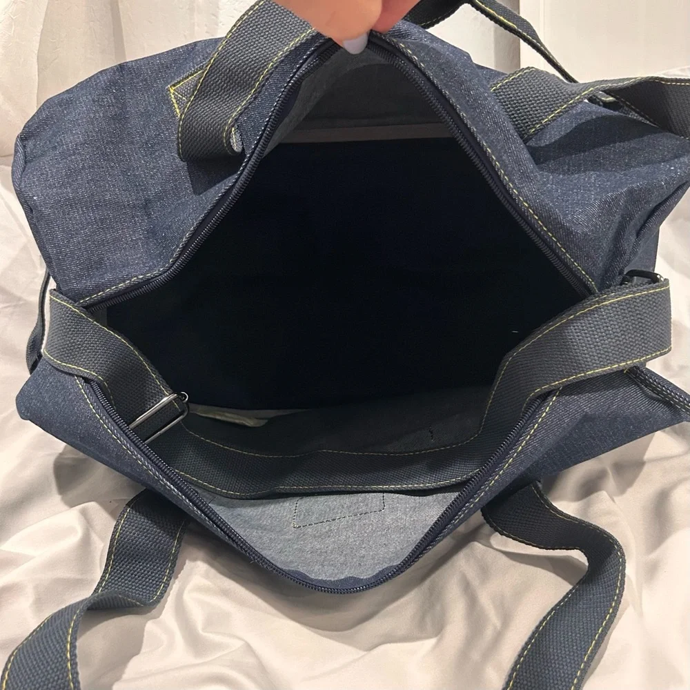 Jean Paul Gaultier pour Vous denim weekend duffel bag with adjustable strap